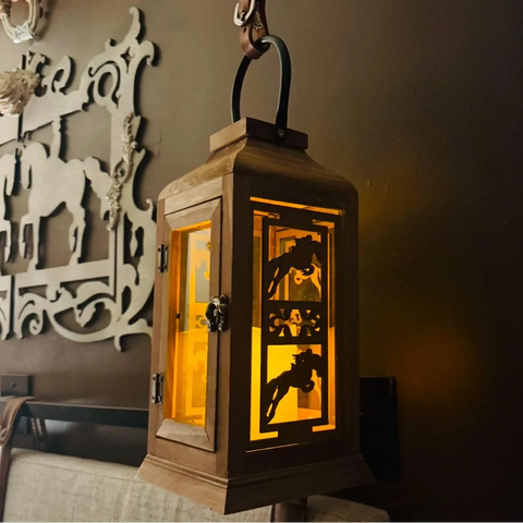 Wooden lantern with horse designs on a decorative shelf