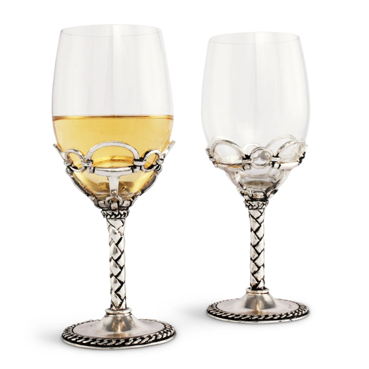Two wine glasses with silver bases on a computer screen displaying an equestrian-themed product page.