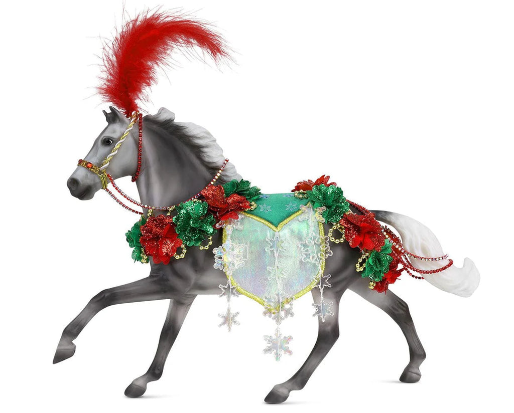 Decorative horse figure with red and green ornaments on a white background