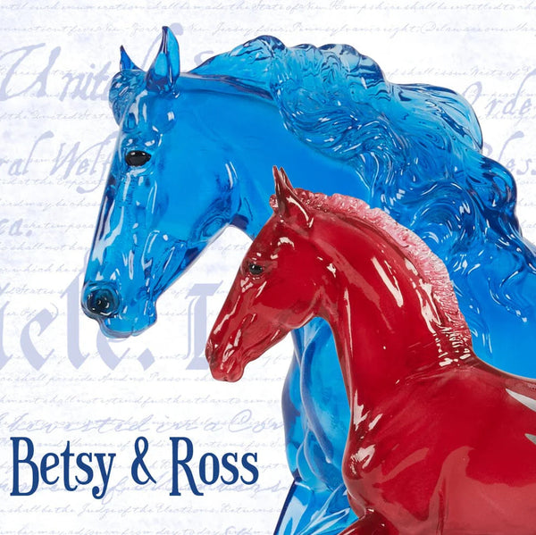 Two horse figurines, one blue and one red, on a white background with text.